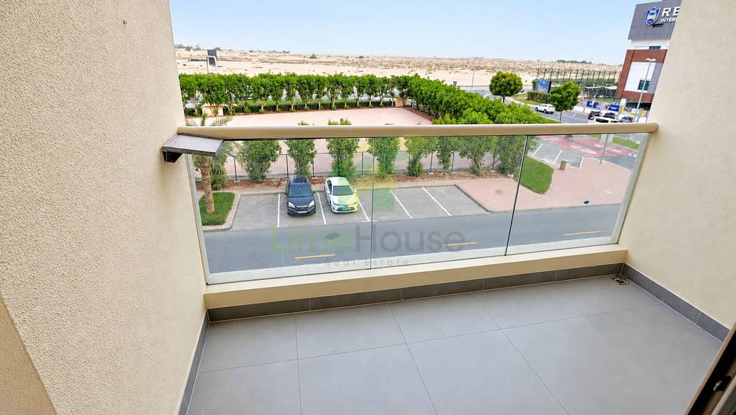 11 11-dubai-the-greens-al-arta-4-1br-apartment-balcony-community-view-01. jpg