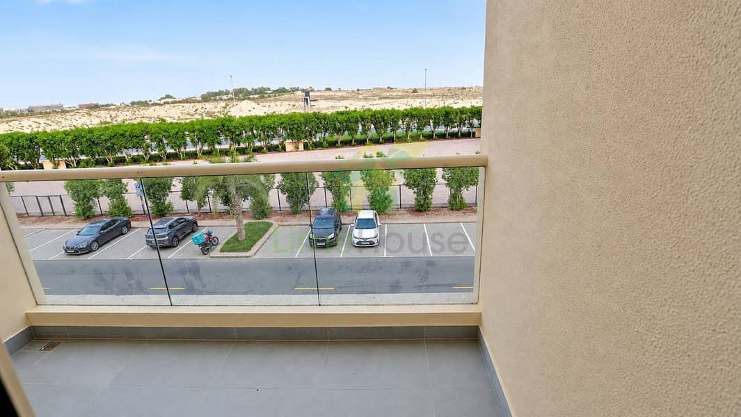 12 12-dubai-the-greens-al-arta-4-1br-apartment-balcony-community-view-02. jpg