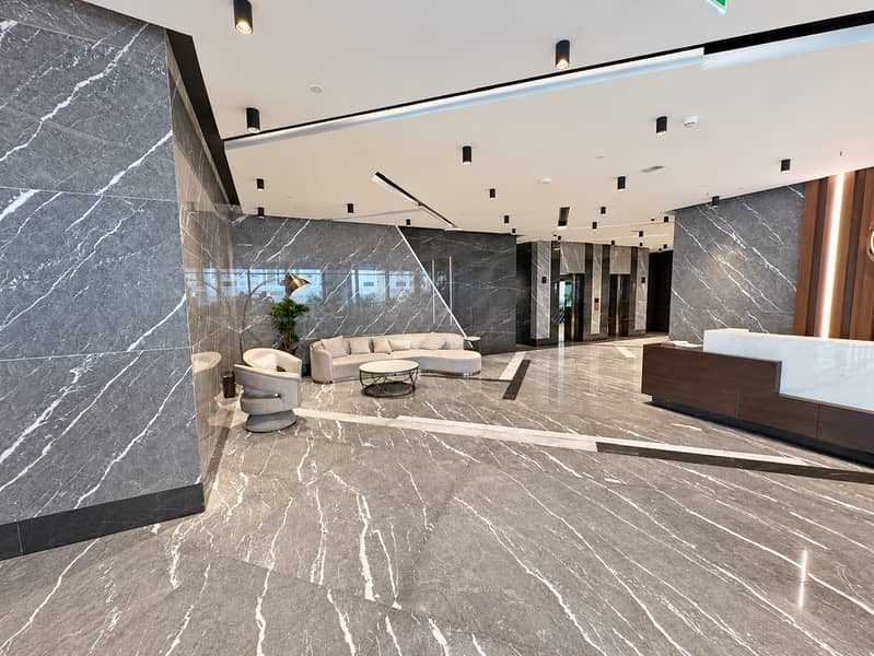 11 Bright, polished property lobby-9. png