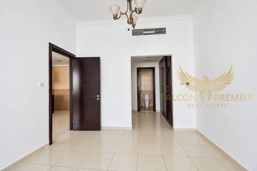 10 Beige tiled bathroom with dark wood-4. png