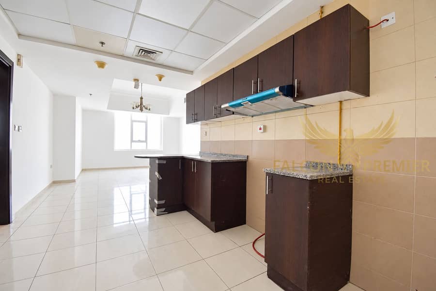 18 Warm kitchen interior with dark cabinetry-2. png
