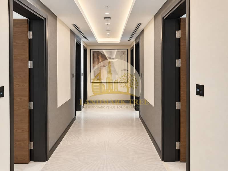 6 Elegant Sunburst-Tiled Hotel Corridor. png