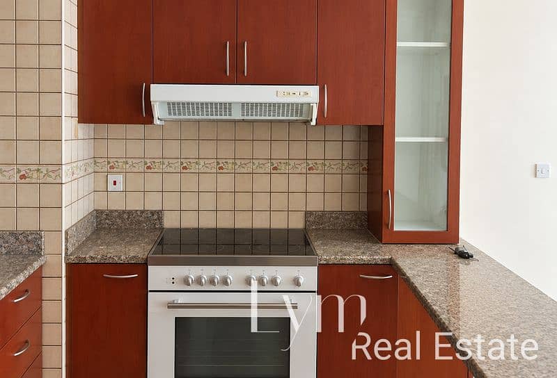 3 Bright Mahogany Kitchen with Granite Counters. png
