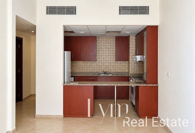 5 Straight-On Modern Kitchen Interior. png
