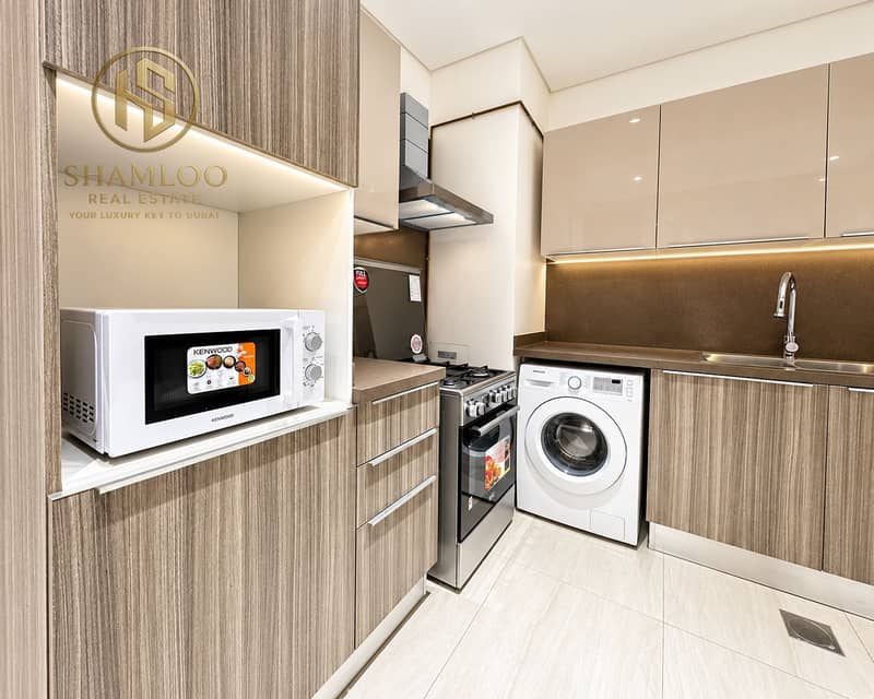 11 Bright Modern Kitchen with Integrated Appliances. png