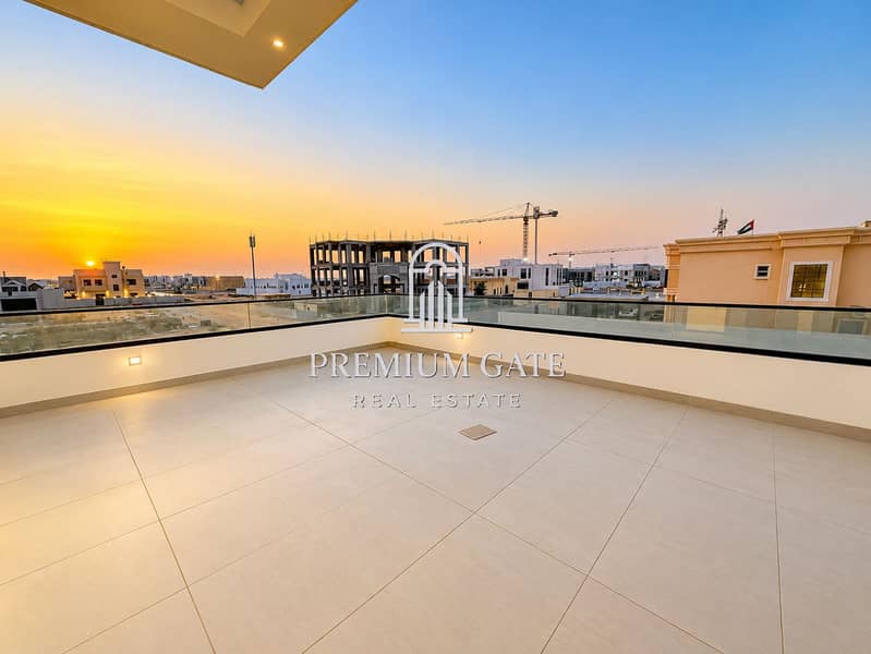 18 Sunset Rooftop Terrace Overlooking Construction Skyline. png