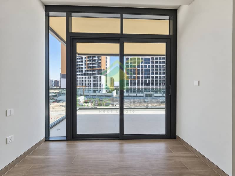 12 11-dubai-sobha-hartland-sobha-waves-opulence-3-bedroom-apartment-bedroom-window-11. jpg