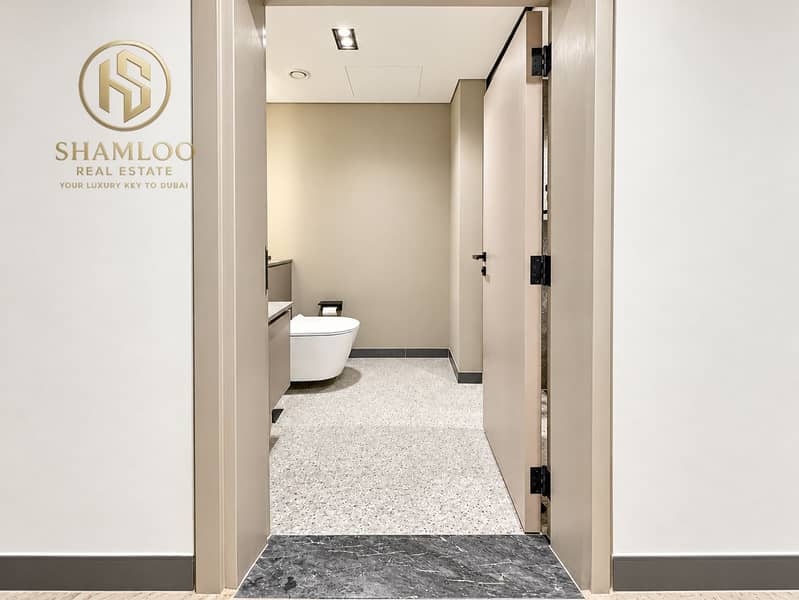 7 Modern Minimalist Bathroom Through Doorway. png