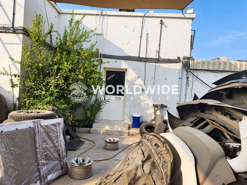 7 Sunlit auto salvage yard (2). png