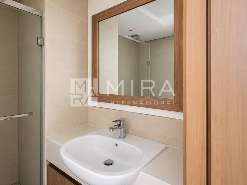 10 Bathroom basin with wood-framed mirror-6