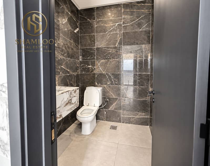 7 Modern Charcoal Marble Powder Room. png
