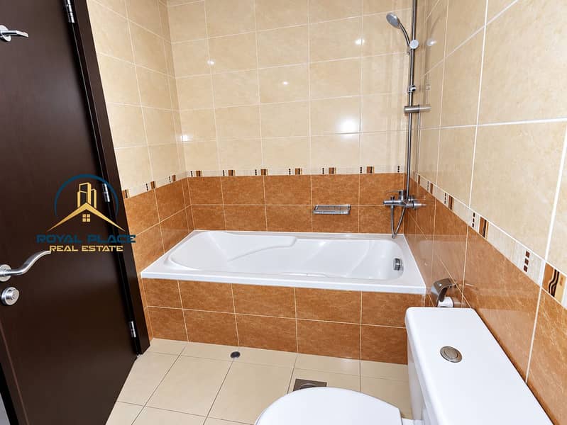 11 Modern Beige Marble Bathroom with Bathtub and Shower. png