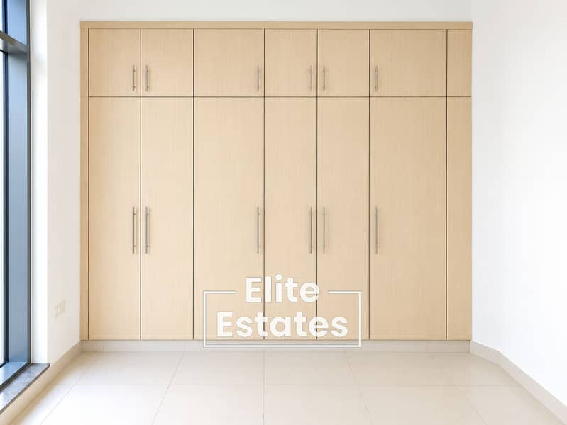 7 Minimalist Light-Oak Wardrobe Interior. png