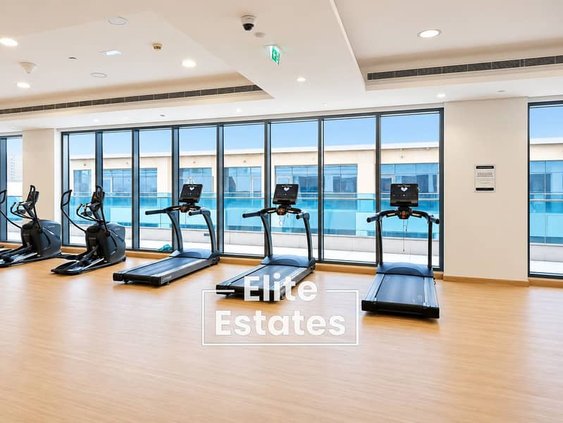 12 Bright Modern Gym with Treadmills and Ellipticals. png