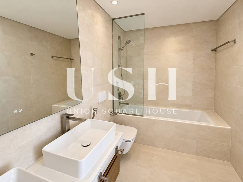 9 Minimalist Beige Spa Bathroom. png