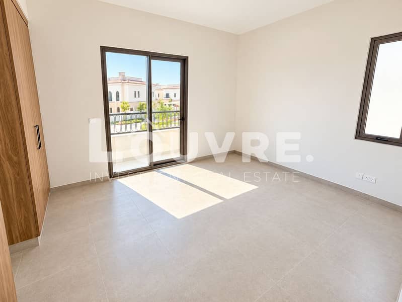 25 Bright Minimalist Bedroom with Balcony View. png