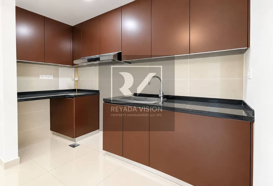 7 Modern Chocolate-Brown L-Shaped Kitchen. png