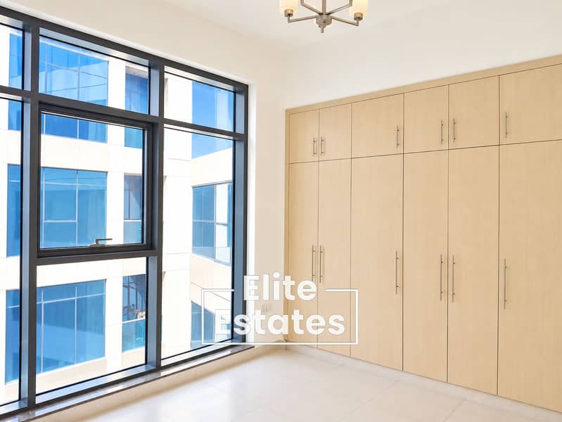 4 Bright Minimalist Bedroom with City View. png