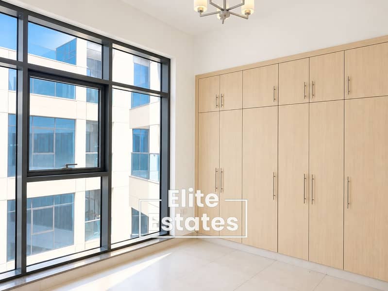 9 Bright Minimalist Room with Window and Wardrobe. png
