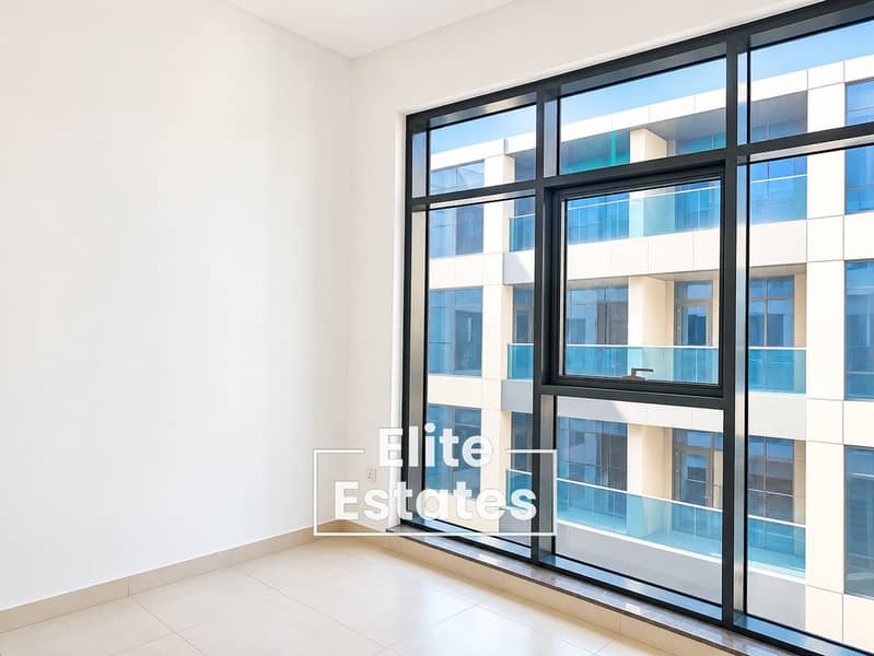 10 Bright Minimalist Room with Urban Views. png