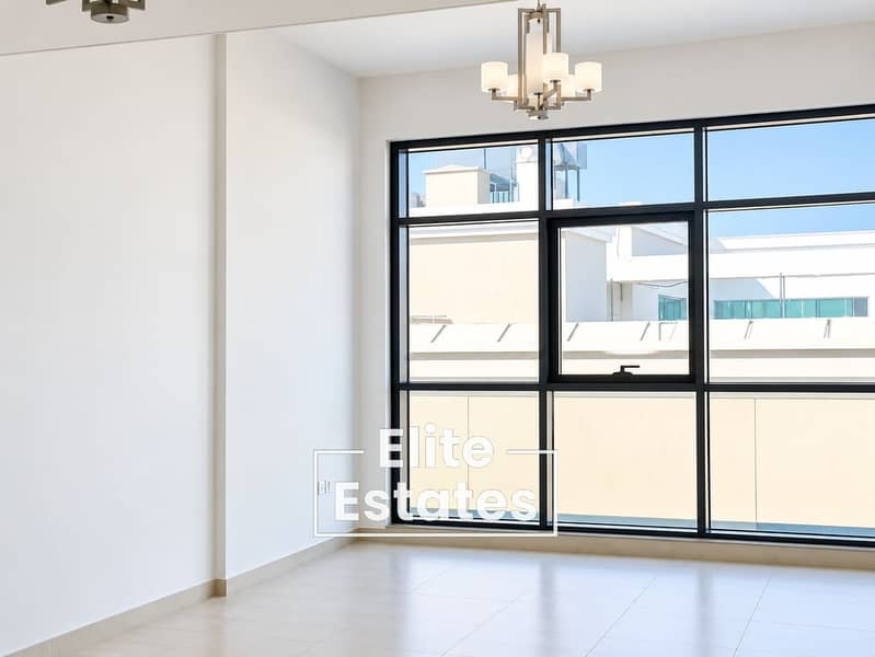 11 Sunlit Minimal Room with City Views. png