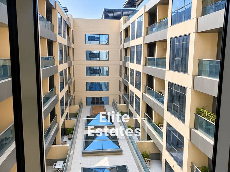 22 Symmetrical Sunlit Atrium Courtyard. png