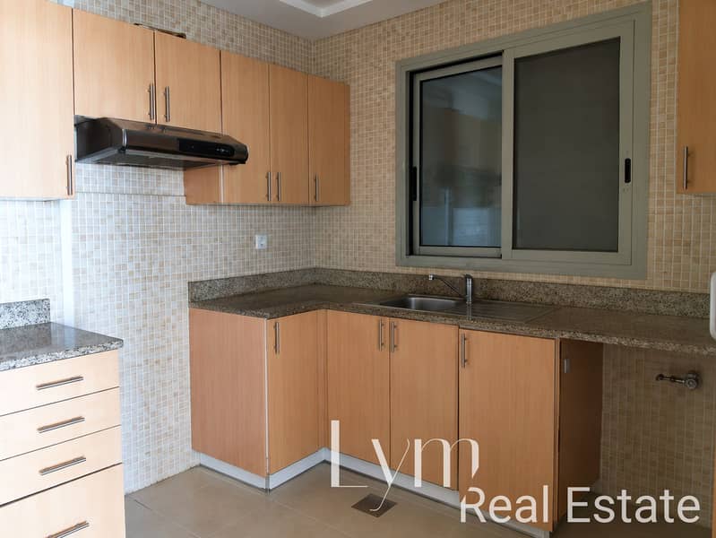 5 Compact Maple Kitchen with Window Sink. png