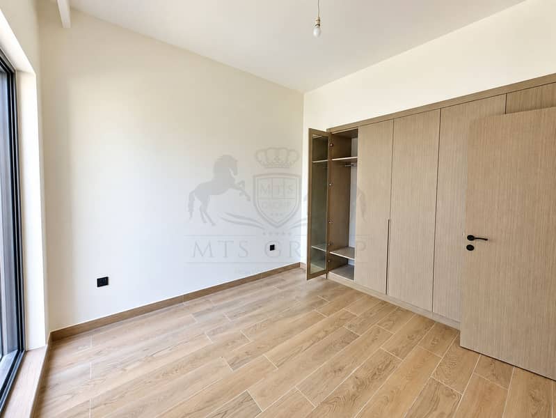 4 Bright Minimalist Bedroom with Built-In Wardrobe. png
