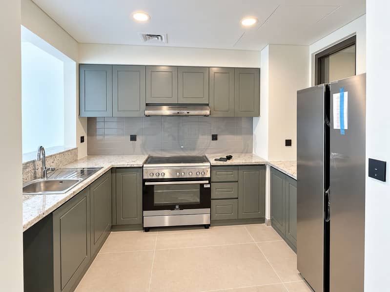 7 Modern Gray-Green U-Shaped Kitchen. png