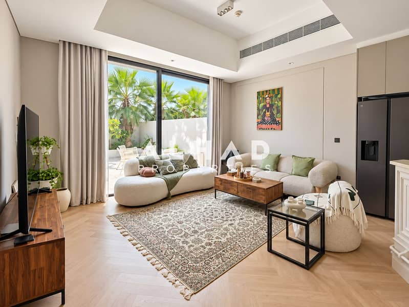 3 Bright Modern Living Room with Courtyard Views. png