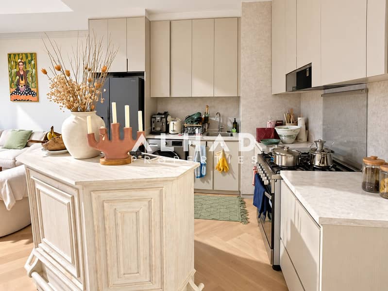 4 Warm Modern Kitchen with Styled Island. png