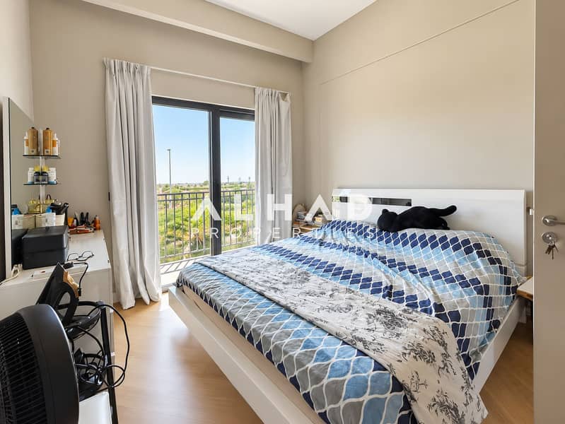 7 Bright Minimalist Bedroom with Balcony View. png