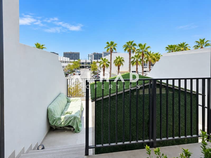 10 Sunny Modern Balcony with Palm Views. png
