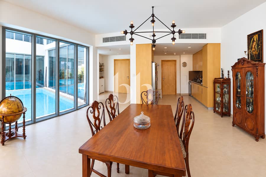 2 Sunlit Dining Roomwith Antique Cabinetry
