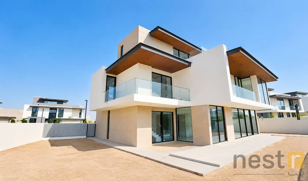3 Modern Luxury Villa Under Clear Skies. png