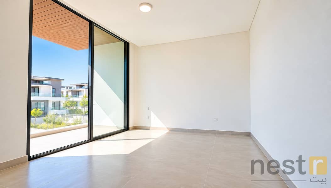 7 Sunlit Minimal Interior with Balcony Views. png