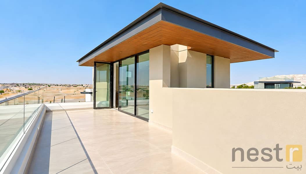 14 Modern Rooftop Terrace Under Blue Skies. png