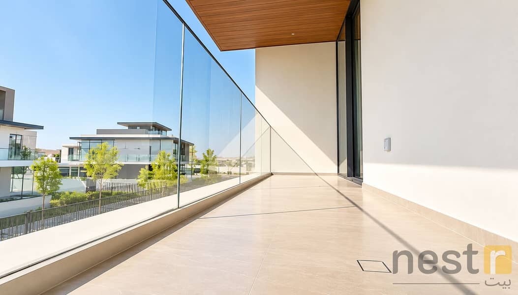 15 Modern Balcony with Glass Railing and Sunlit Shadows. png