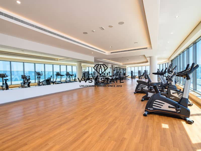 14 Sunlit Luxury Gym with Waterfront Views (1). png