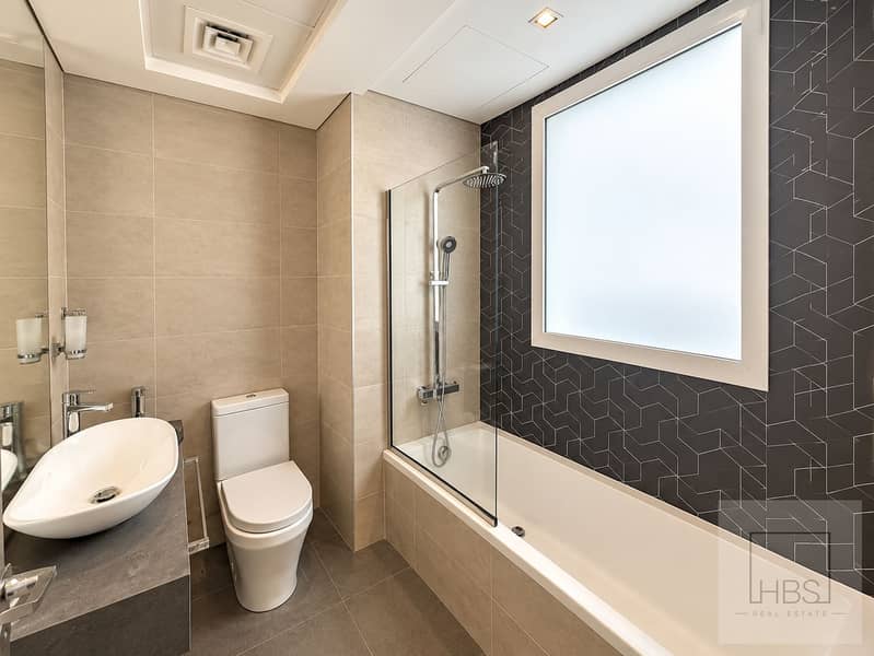 7 Modern Geometric-Tile Bathroom Retreat. png
