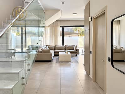 3 Bedroom Villa for Rent in Mohammed Bin Rashid City (MBR City), Dubai - Bright Modern Living Room with Glass Staircase. png