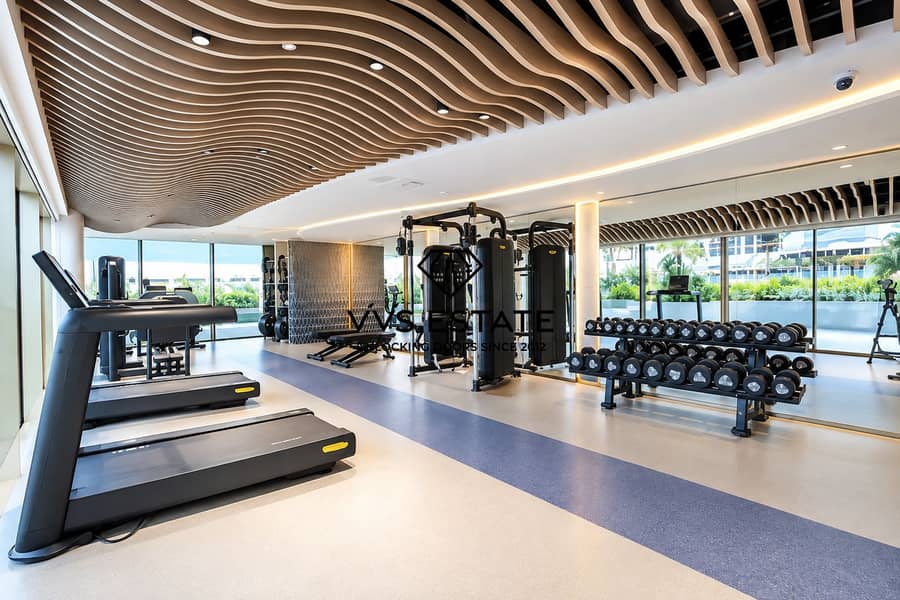 43 Luxury Gym with Wave-Slat Ceiling. png