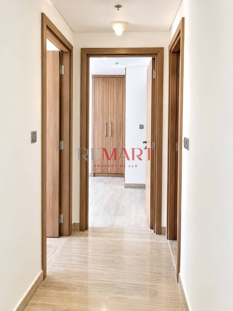 8 Modern Hallway with Warm Wood Accents. png