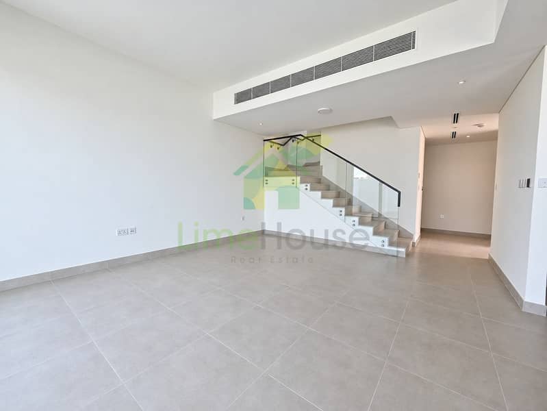 2 02-dubai-rosa-arabian-ranches-4-bedroom-corner-townhouse-open-plan-living. jpg