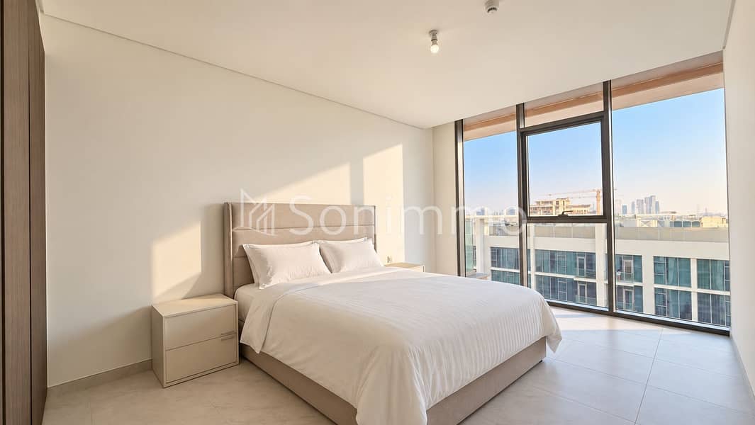 7 Bright Minimalist City-View Bedroom. png