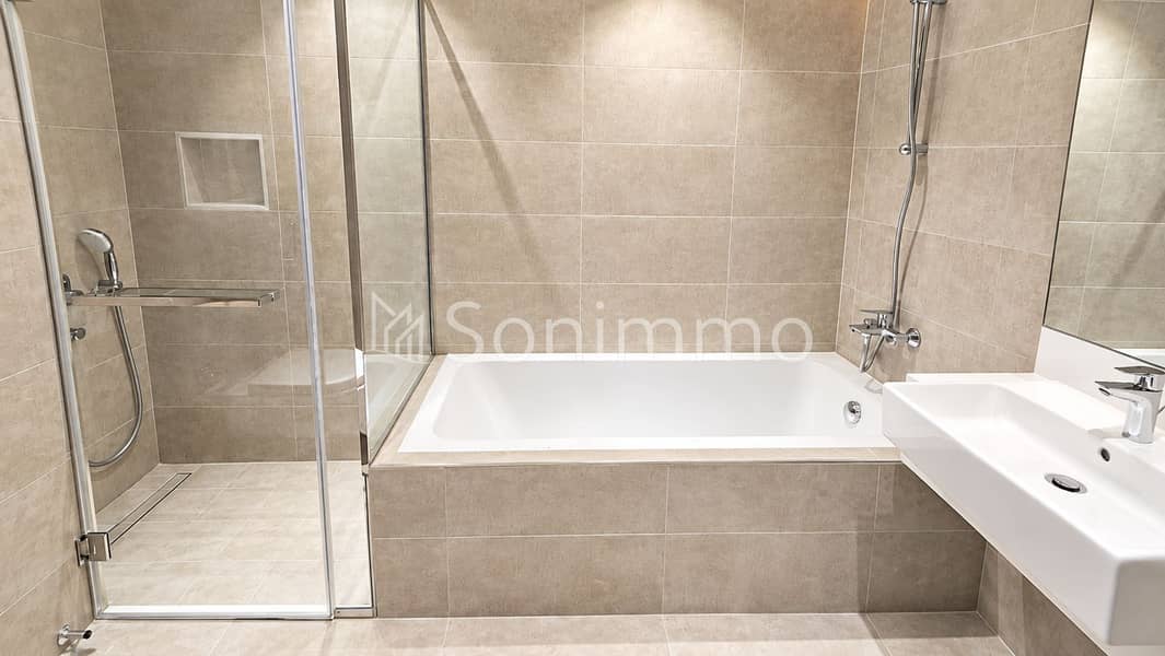9 Modern Beige Tile Bathroom Retreat. png