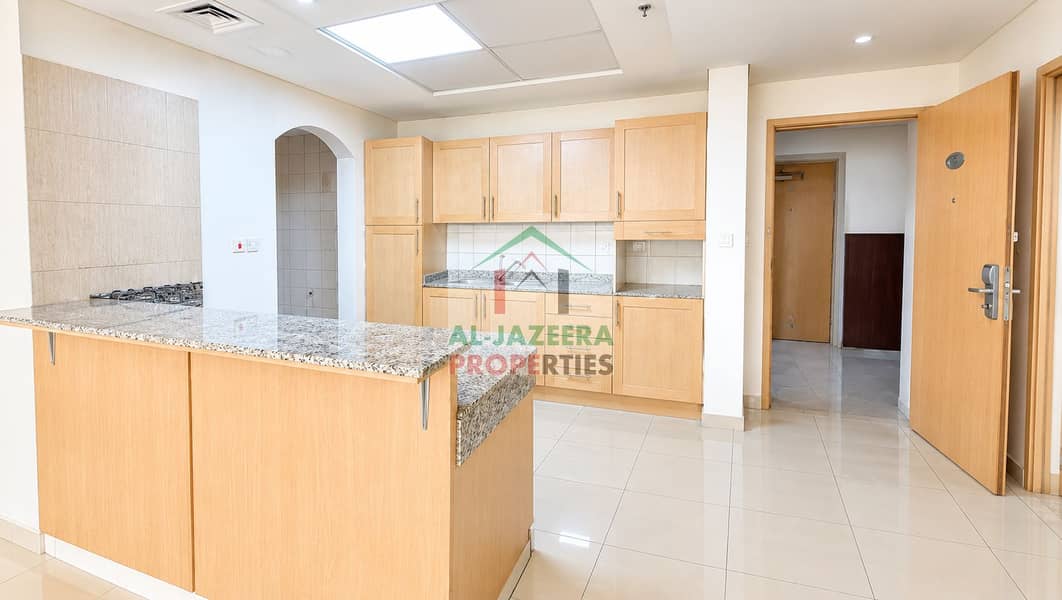 5 Bright Modern Kitchen and Entryway. png
