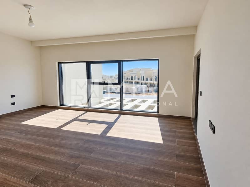 7 Sunlit bedroom with broad three-panel window-2