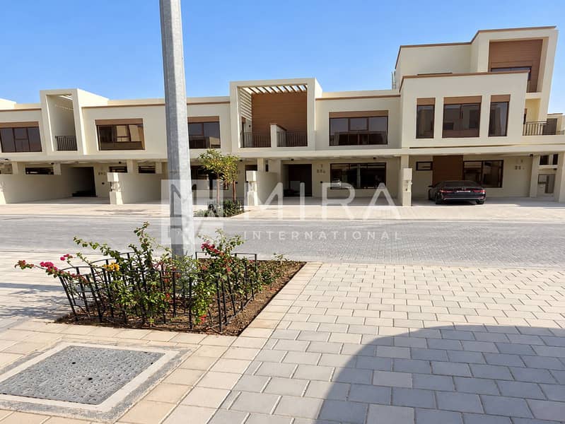 16 Street-Level View of Cream Townhouses-7