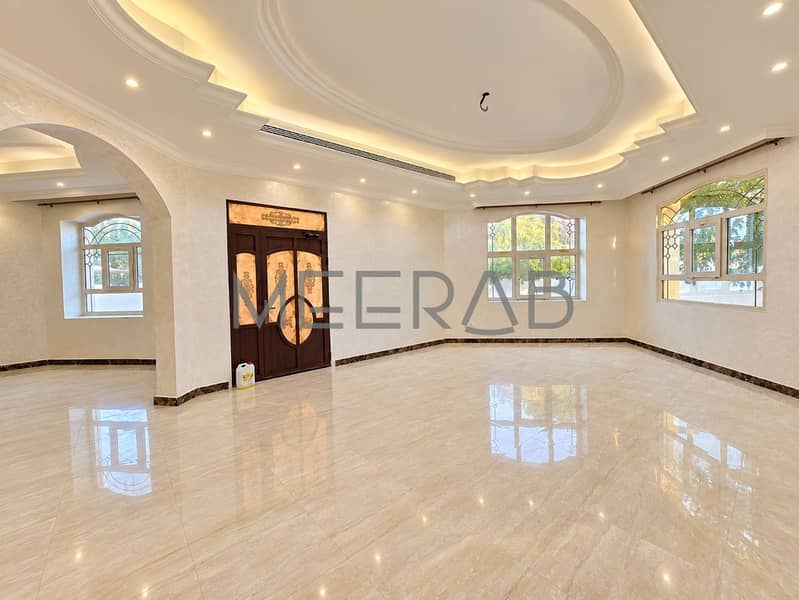 4 Luxurious Cream Marble Foyer with Ornate Door. png